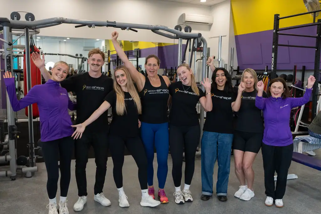 A Body Shape team photograph taken on the gym floor